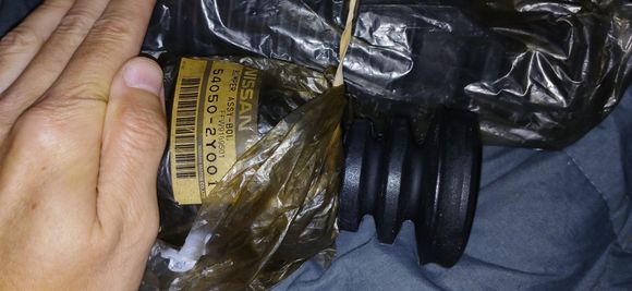Pic: Genuine oem FRONT shock boots for '03 Nissan Maxima SE 3.5L part #54050-2Y001 with (2) rubber ribs. 