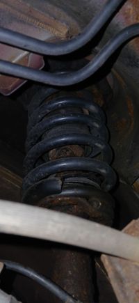 When testing the suspension by pushing down on the car, there's no bounce, so the factory SE springs both front/rear they seem to be strong still... but don't know how much longer til they start showing fatigue