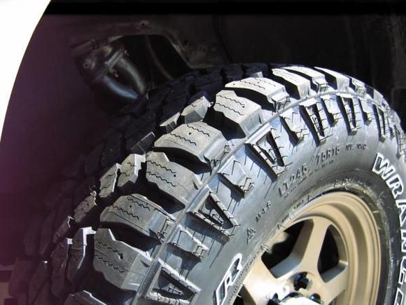 New Meat on the truck...Good Year Duratrac's on Ray's Nismo bronze truck wheels.