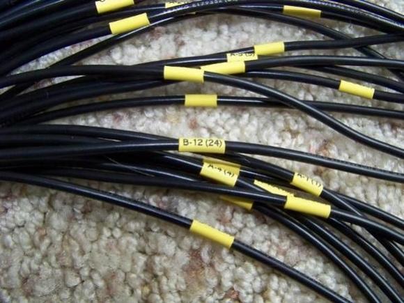 Close up of label. B-12 (24) stands for connector B, pin 12, wire 24.