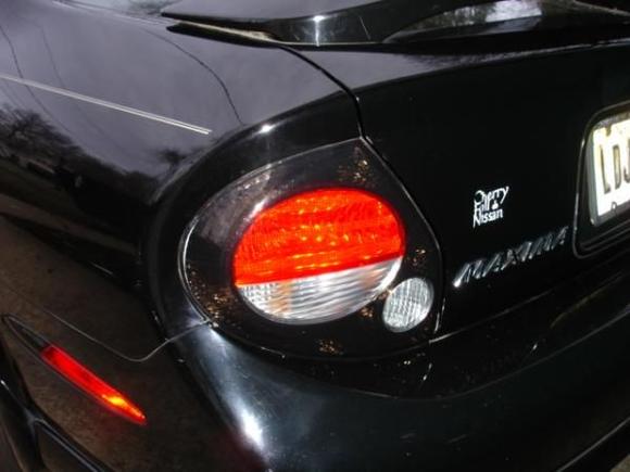 20AE taillights, sort of a smoked lens instead of a separate piece of brightwork