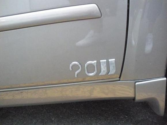 20'' emblem on the corner of the door