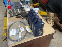 All the parts neatly assembled. 5 litres of BMW recommended LL01FE Engine Oil. From BMW India.