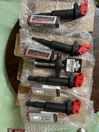 Set of 4 coils and spark plugs and puller tool