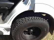 When you open the door, you can see where the original car ended.  The new tires widen the stance by over 10 inches.  And in accordance with Icelandic law, your fender flares must cover your tires.  Very considerate not to throw your mud on others.  The new width eliminated the Montero's notorious top-heavy feel.