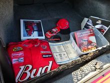 All original manuals, original sales literature, a Dale Jr. book with CD, Dale Jr. racing jacket, cover and other memorabilia.