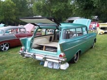 (windowed) Sedan Delivery
Rumored to be 1 of 92 made in 1957. 
Runs a 1960 235 6 cylinder engine, original 3-speed manual trans and stock rear with 3:70 gears. 
Paint is 1957 Chevy Highland Green.