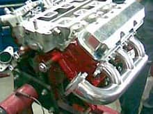 The beauty of a 3800 Series II full race engine.  It's my original factory block bored .10 over. ZZP exhaust power log manifolds which I had coated. Upper intake custom ported. Custom Head work done by a renowned local individual &quot;Charley Jones&quot;. Metal rocker covers no more composite factory type.