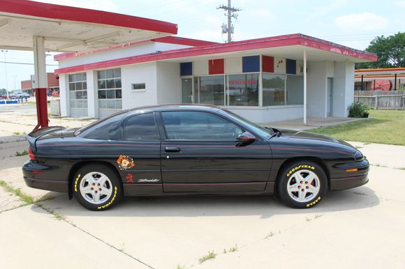 My Monte at an abandoned filling station