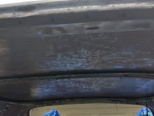 Interior roof sanded prior to rust prevention applied