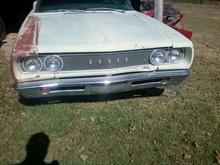 hmmmm.... I really hate the chrome grill. I'm also looking for a black R/T grill for it... not sure if there is a difference may try painting this one.