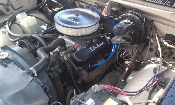 black dress up kit and 4 barrel performer intake and carb in now. (318)