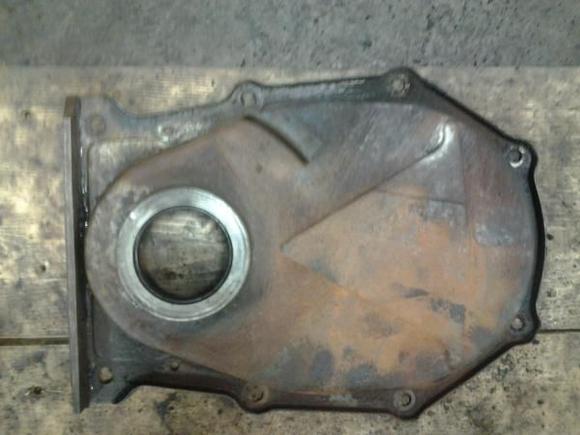 Timing chain cover before cleaning.