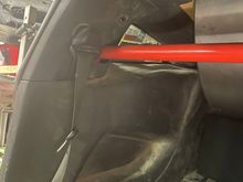 Roll bar tucked up behind stock plastics 