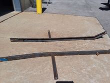 You can see the channel steel instead of the square stock used by ford