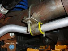 The Whiteline bar attaches to the solid rear axle via "U-bolts."  The bushing saddles attach to these bolts.  The end links simply bolt in to where the drop links did previously.  Installing the new rear sway bar wasn't much more difficult than removing its OEM counterpart.
