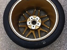 This is the damage to one of the rear gold 18x11 wheels. The damage is all surface damage.