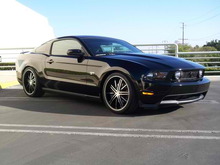 2010 MUSTANG GT (2k miles) on 20's $27,000