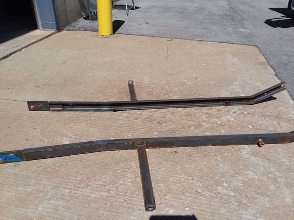 You can see the channel steel instead of the square stock used by ford