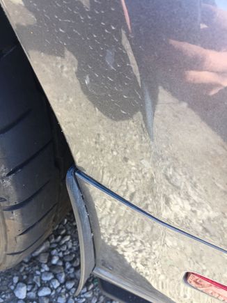 Driver side rear bumper. most of the impact was taken from the front passenger side of the car, assuming the angle i hit the van caused misalignment in the rear of my bumper.