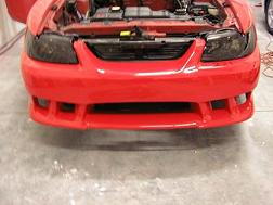 Front bumper paint work all done, also had the headlights smoked out.