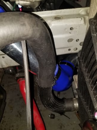 This is from behind the blower down behind the lower radiator hose. This need to be wrapped so the heat from the lower radiator hose doesn't head up the aluminum pipe. 