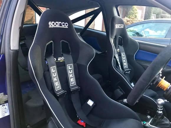 bucket seats and harnessses in place with detachable steering wheel