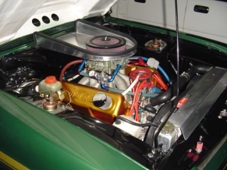 Now is running a 30s boss that my brother built in the back yard, raced drags a cortina TE with this combo