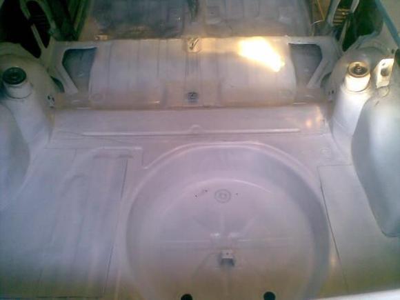car was stripped wire wheeled and primed and painted inside