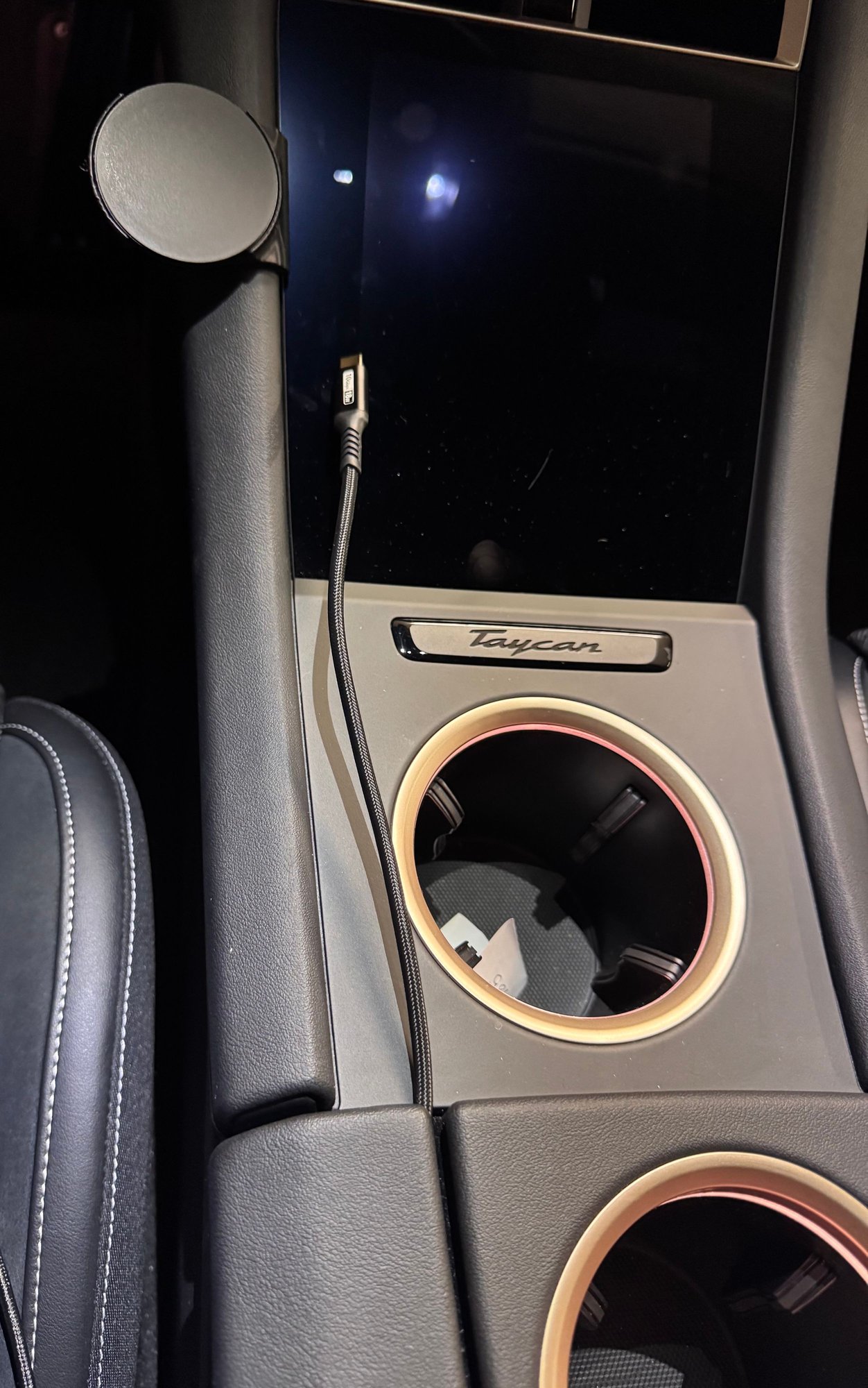 I keep the chord inside the center console when not charging