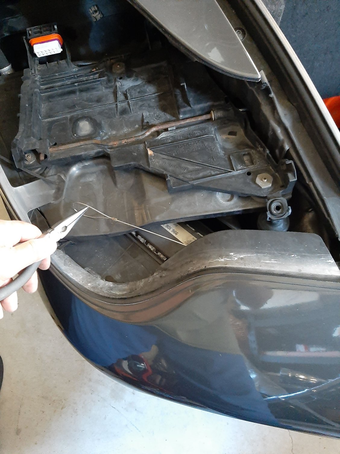 Ready rerouting emergency hood release cable on Porsche 996T