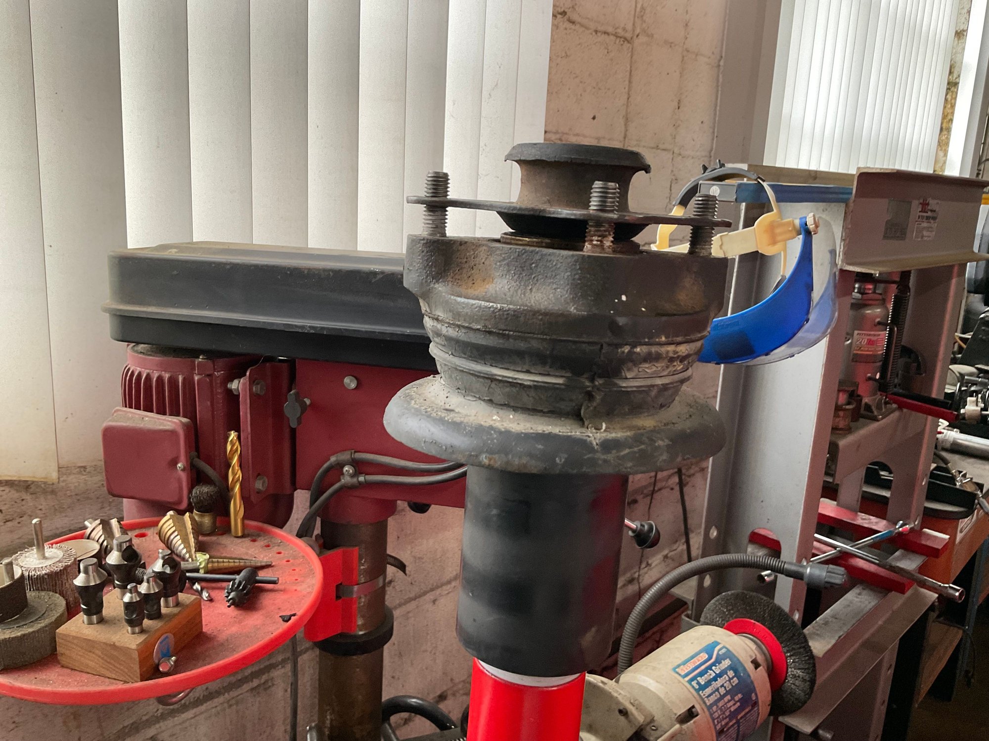 Upper bushing with washer and plate