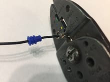 Crimping wire to tab.