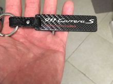 $60 - shipped to lower 48, great condition and no longer available. Porsche quit making this keychain. Real carbon fiber.