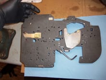 Lower cover reinstalled on separator plate with new gasket.