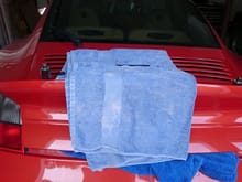 Spoiler is off, use lots of cloths or towels to protect your car.