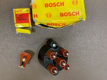 944 rotor and distributor cap, new. $50 for both. 