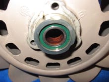 The corrosion on the inner race of the fan hub bearing.
