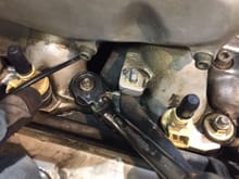 Instead of removing the allen bolt on the intake side plate cover to get a socket on the intake nut below - just use a 13mm gear wrench. 