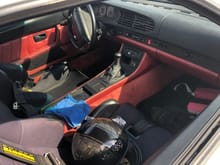 Only interior pic I have but notice stitching on console, dash glove box door, lower dash sections.  This guy used this car as  Porsche Drivers Ed car and this is why his factory seats are missing.