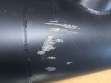 cosmetic damage on back side of pipes