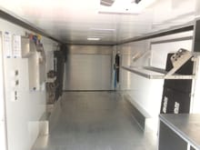 Side door open, LED lighting off- front of trailer to rear