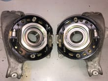 Completed parking brake assemblies, mirror images of each other.