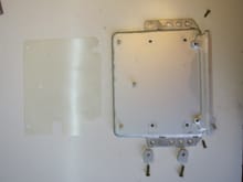 Empty DME base plate, insulating sheet and hardware.