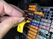 Go ahead and either solder or wire wrap your fuse on the side that does not have the tab and push it into place so that the wire is running to the side without the tab and the other contacts on the fuse is touching the middle tab on 42 a