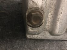 Is the oil pan double-walled by chance?  See double wall next to this bolt.  