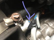 This is showing the wire clipped off and put together with electrical wire. I'll follow up with a better solution when I get some solder, and the next time the water pump comes off.