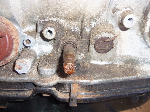 Range selector switch removed, showing the manual gear selector shaft.