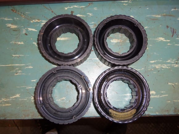 New 928 International rubber isolators on the left, worn originals on the right. Note how the isolators are 'cupped'. Deeper part of the cup is shown at top, and faces in on the vibration damper.