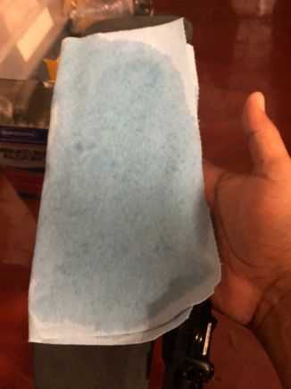 Folded a blue shop towel in half and soaked it in the alcohol 